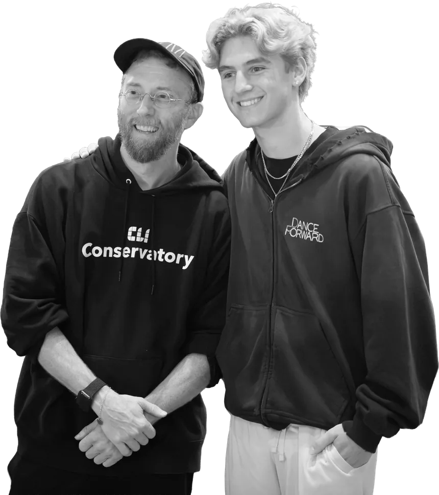 Two DanceForward team members smiling side by side