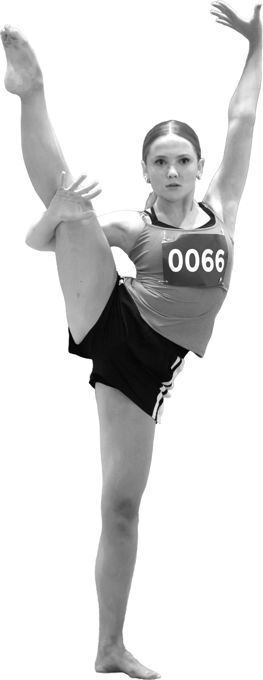 Dancer in a standing split holding her leg overhead